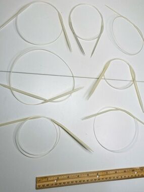 7 Circular Plastic Knitting Needles: Ivory color, Clear Cables, Different Sizes